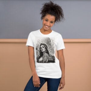 Smiling woman with dark curly hair in a white graphic tee, posing against a two-tone gray and peach background.